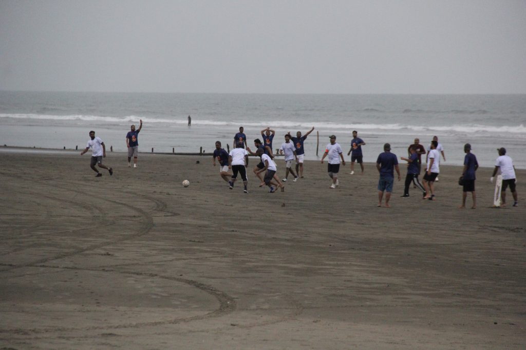 Friendly beach football match